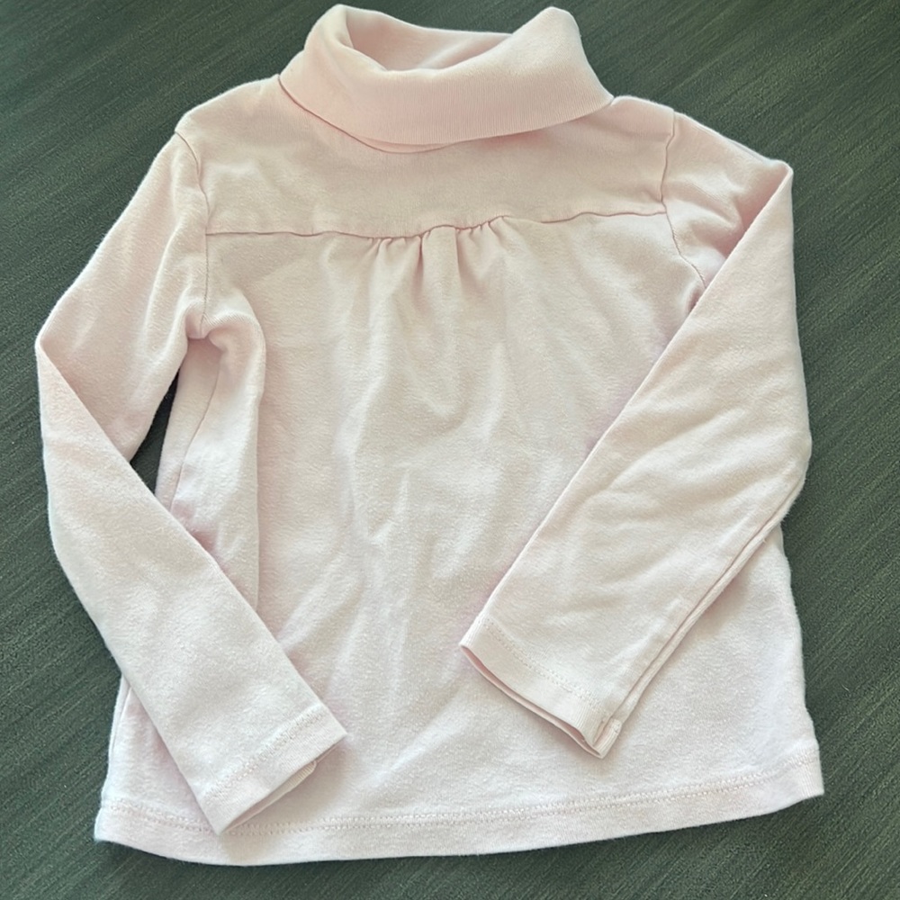 Pink turtleneck